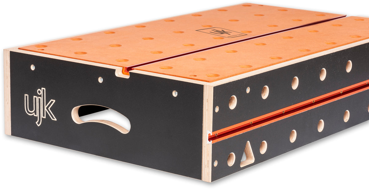 Compact UJK workbench with T-Track and 20mm dog holes, ideal for on-site and small workshop use