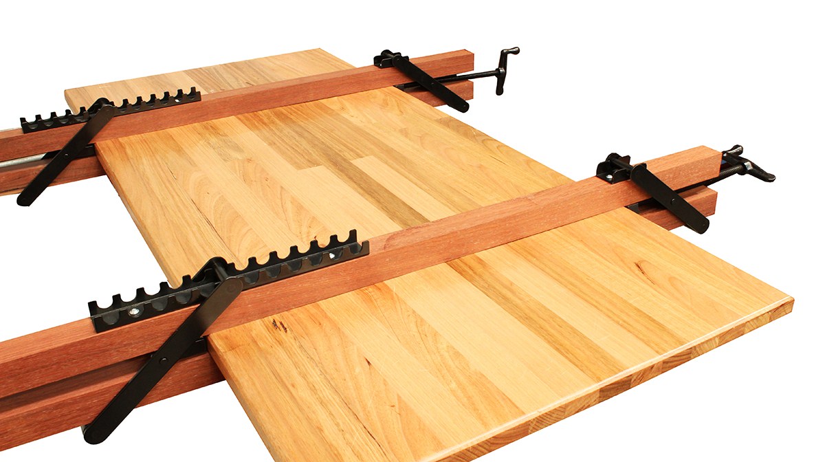 Torquata Set of Four 4-Way Panel Clamp Hardware Sets in use on large woodworking project