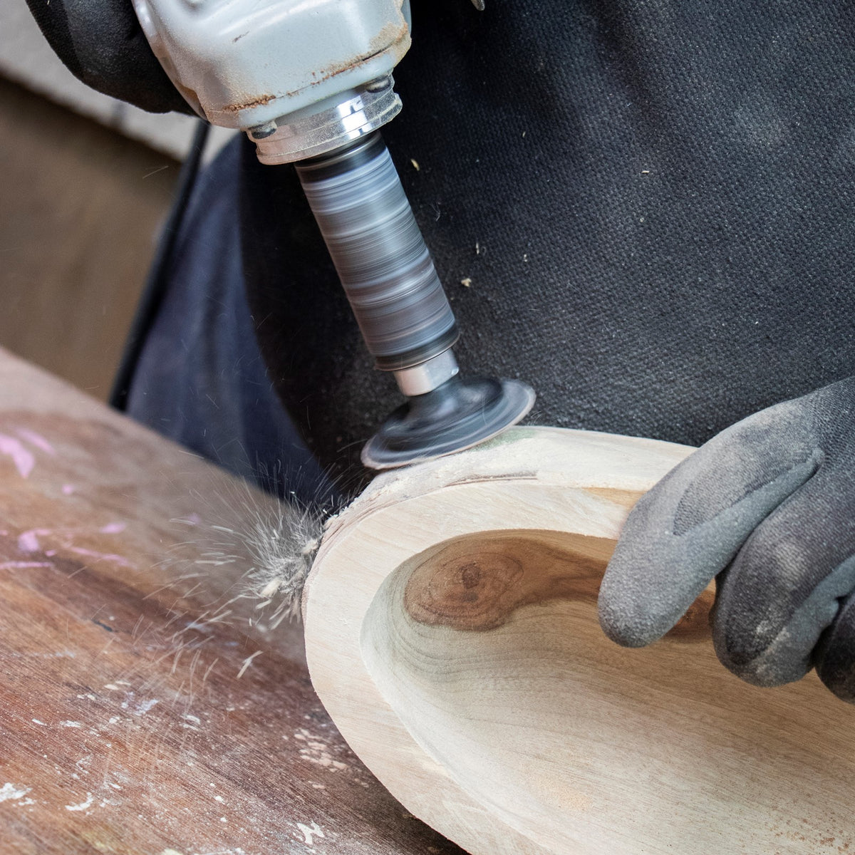 Arbortech Contour Sander Attachment in action with sanding disc attached