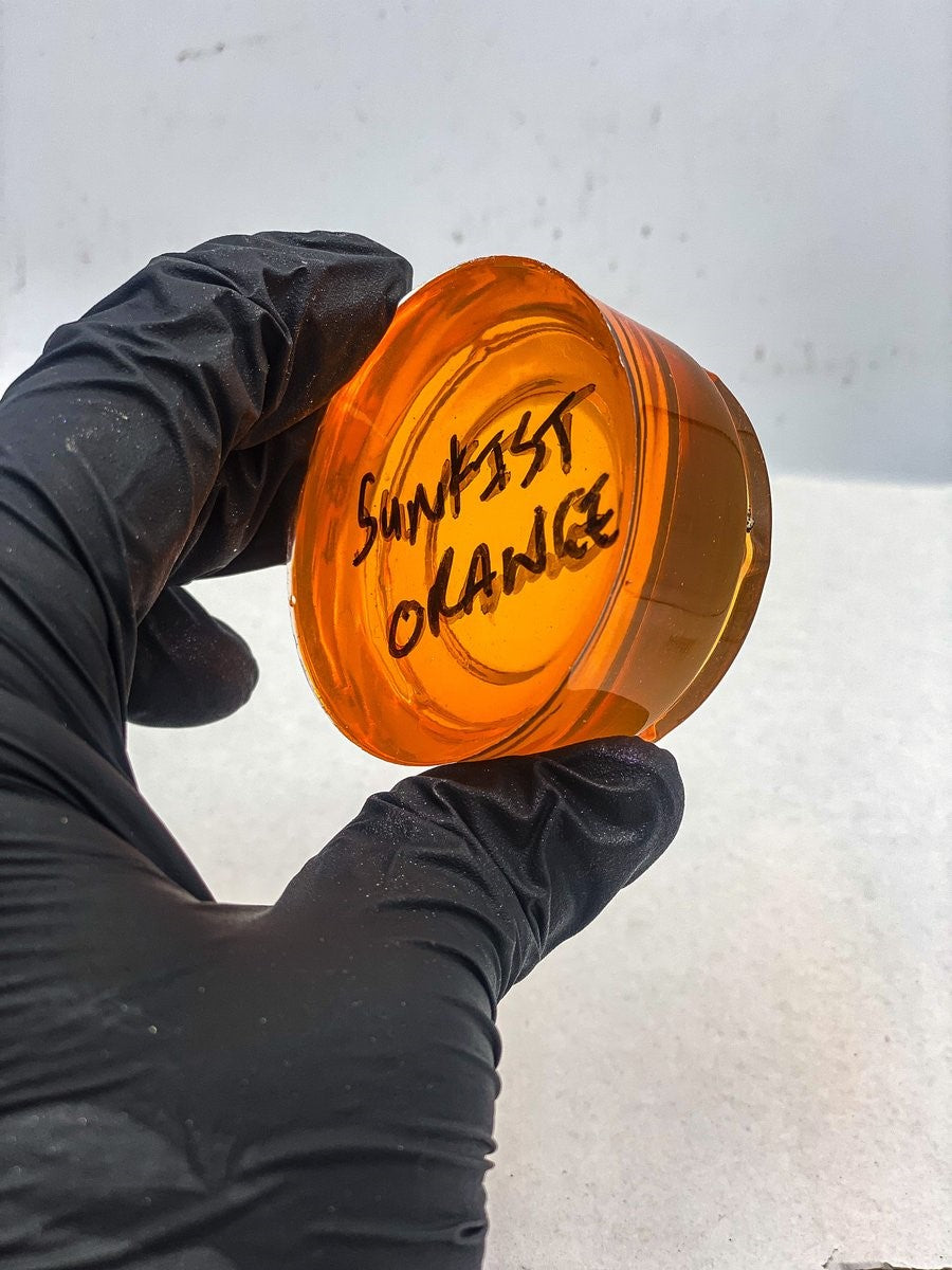 Health of Mind Art Sunkist 20mL Translucent Colour Dye being mixed with epoxy resin
