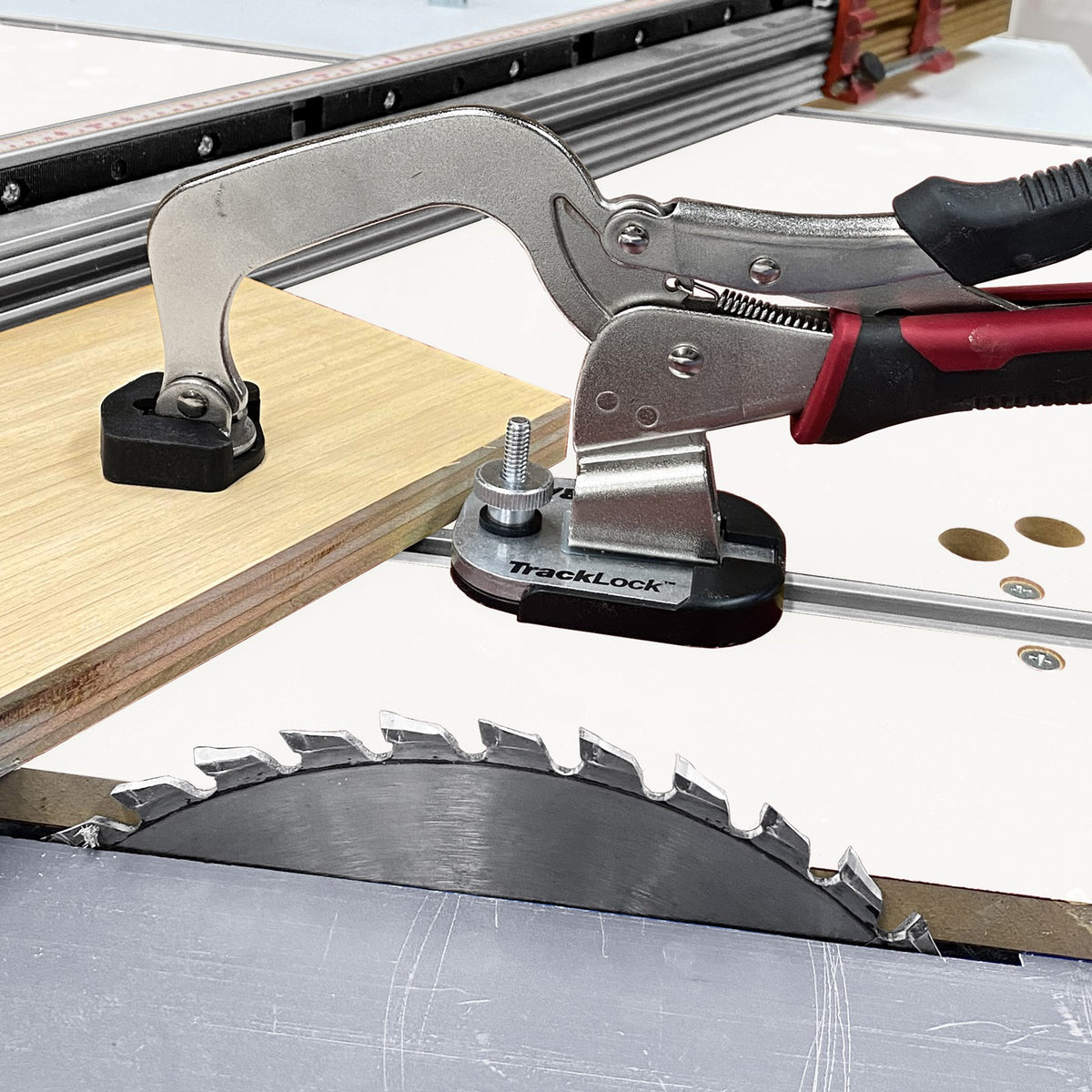 Milescraft TrackLock T-Track Clamp Base Conversion Kit on workbench with bench clamp attached