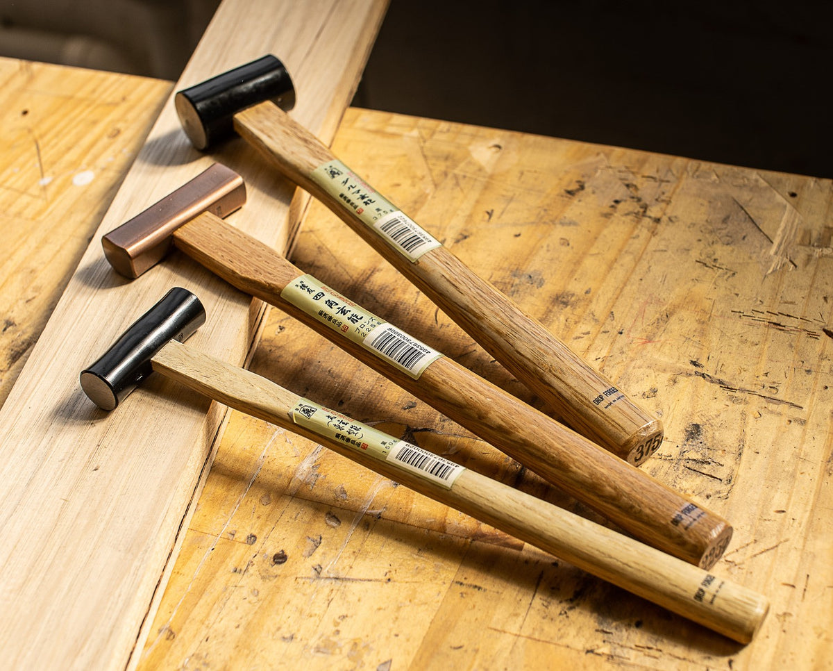 Susa Seisakusho Set of 3 Genno Artisan Hammers - Close-up view of three Japanese woodworking hammers