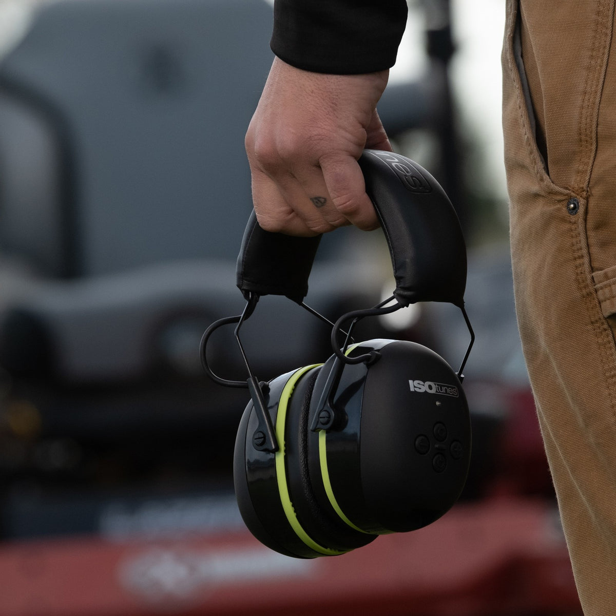 ISOtunes Air Defender Bluetooth Earmuffs in Black/Green, angled view showing sleek design for woodworkers