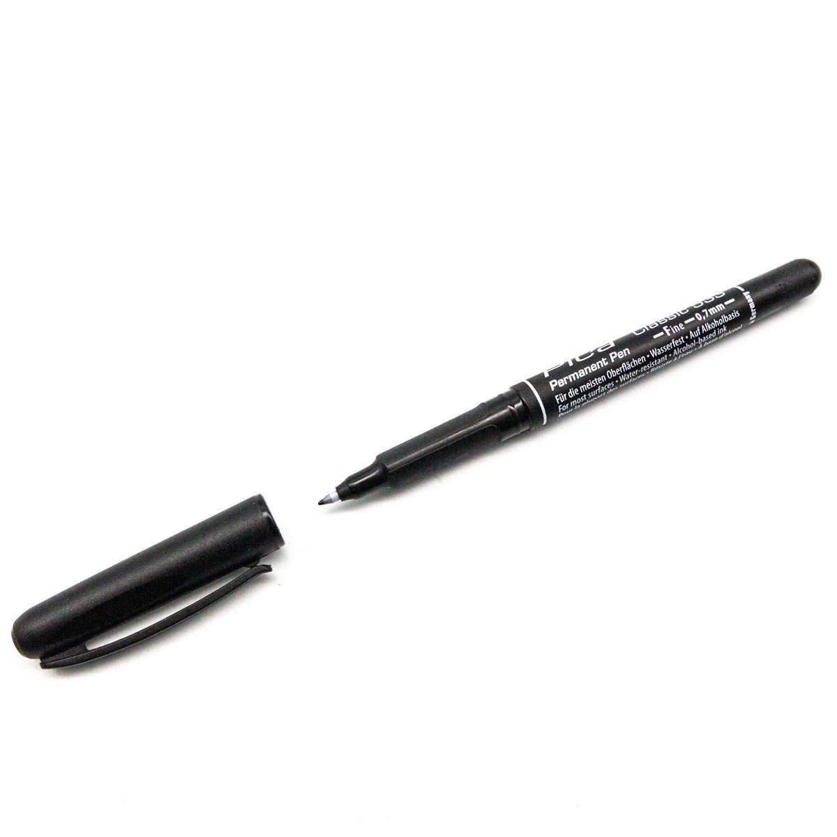 Pica Classic 533 Fine Nib Permanent Marker Pen in use on wood surface