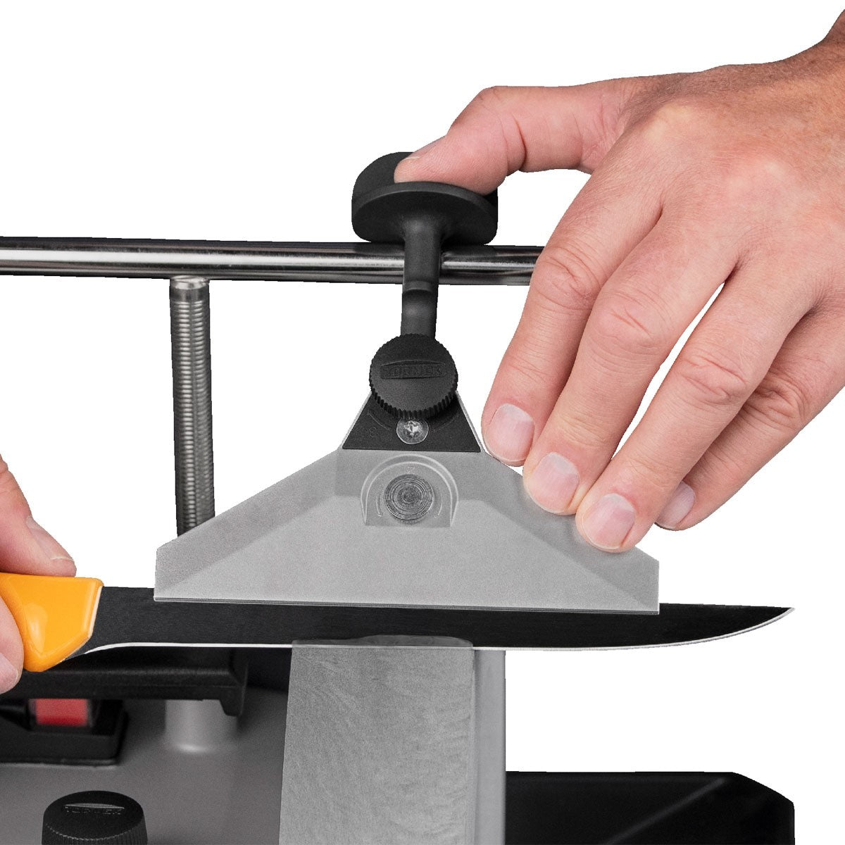 Tormek Wetstone Grinder Wide Centering Knife Jig in use on a wooden blade