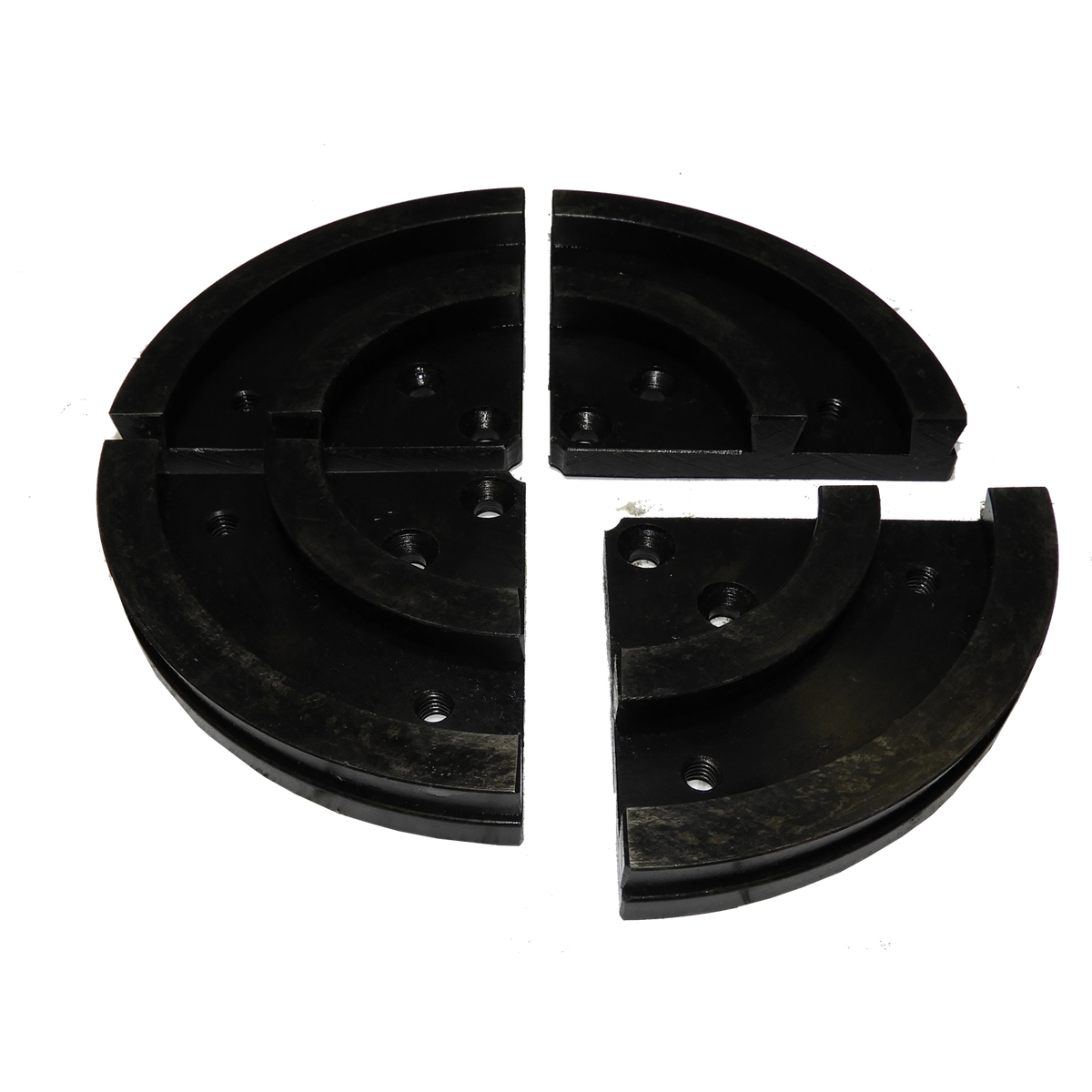Vicmarc Multipurpose Jaws for VM90/100 Chuck on wood lathe, with segments removed for versatile use. Uni-Chuck adaptability shown