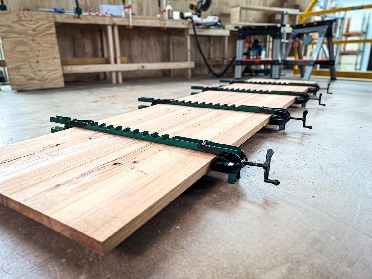 Torquata Set of 2 Panel Clamps showing dual steel bar design in use