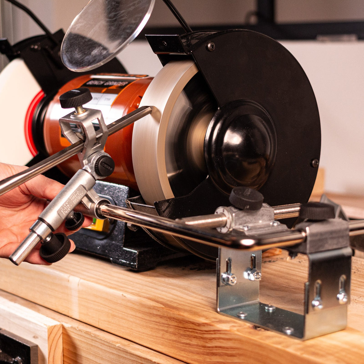 Tormek Bench Grinder Kit in use, showcasing precision sharpening process