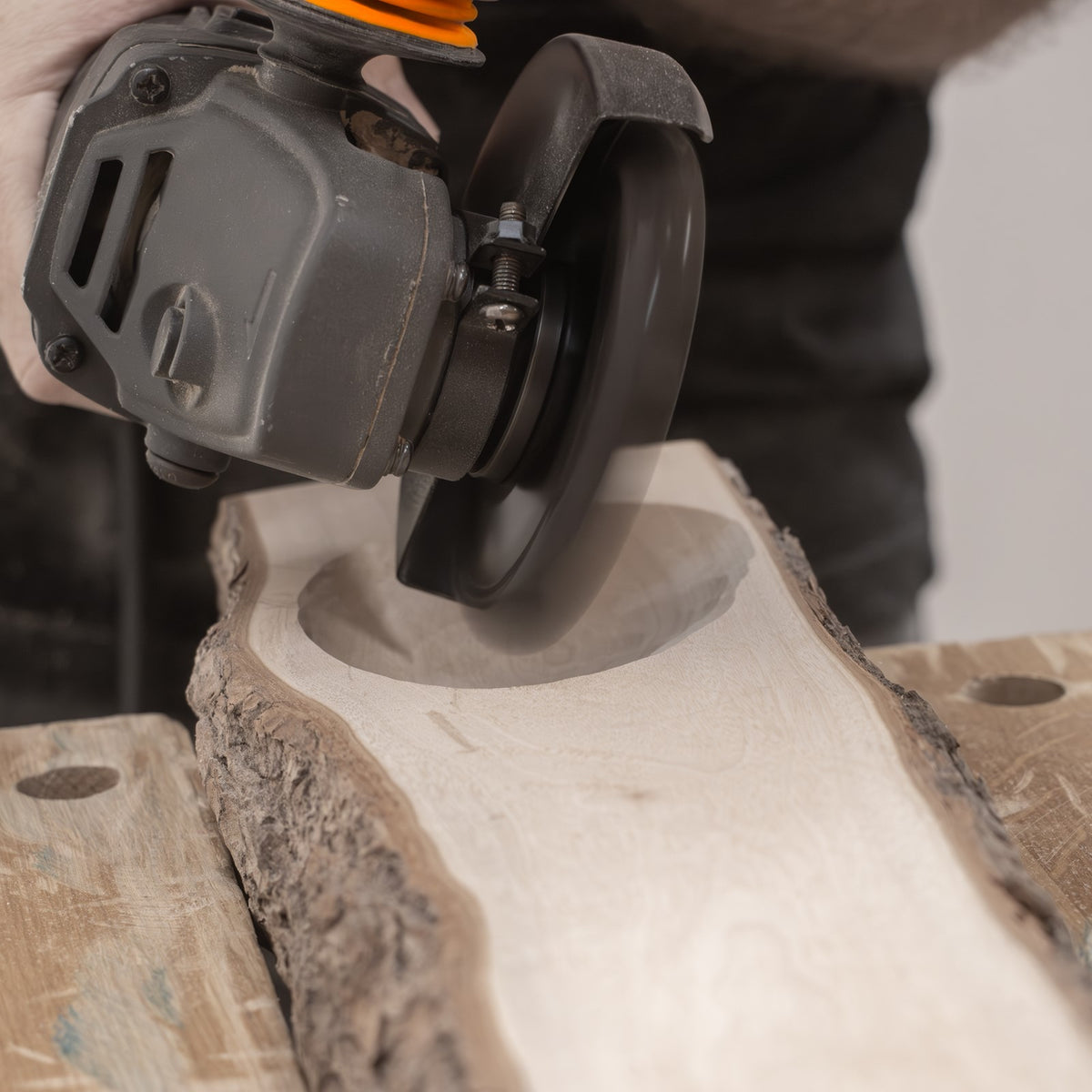 Arbortech Turbo Scraper carving attachment in action, smoothing curves and detailing wood with precision