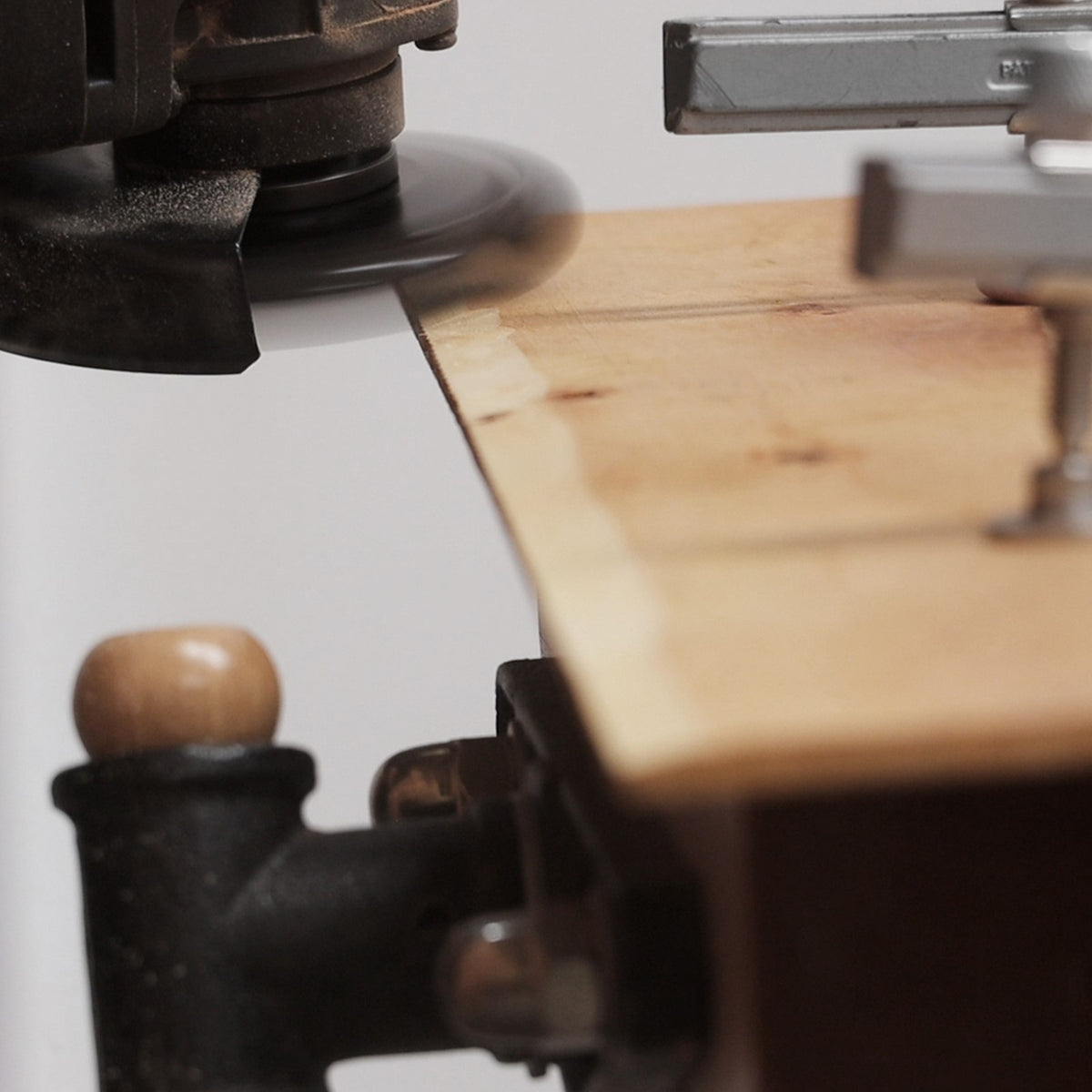 Arbortech Turbo Scraper carving attachment in action on wood surface