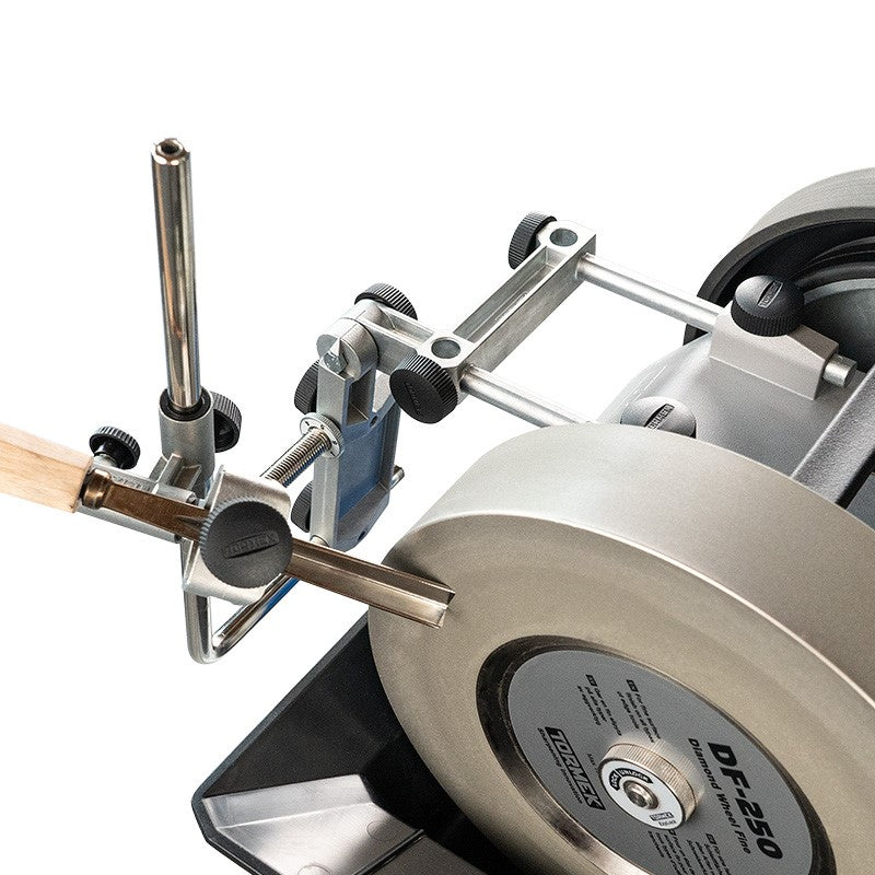 Tormek MB-102 Multi Base sharpening a V-gouge tool on a wetstone grinder