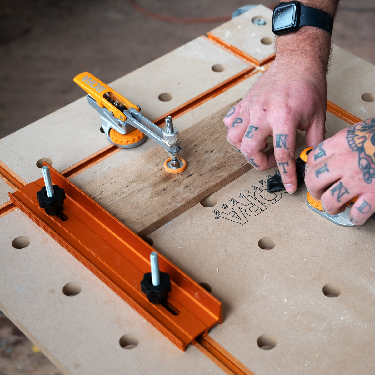 BORA Tool Auto Adjust T-Track Standard Toggle Clamp in action on woodworking project