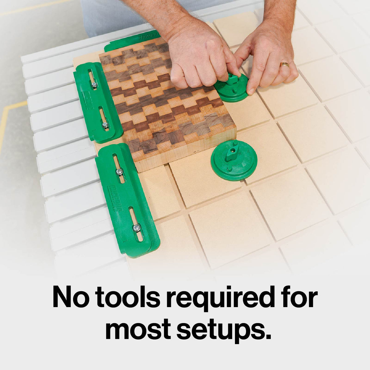MicroJig MatchFit Ring Clamp 2-Piece Kit on Dovetail track, close-up view of Twist-to-tighten cam action clamp