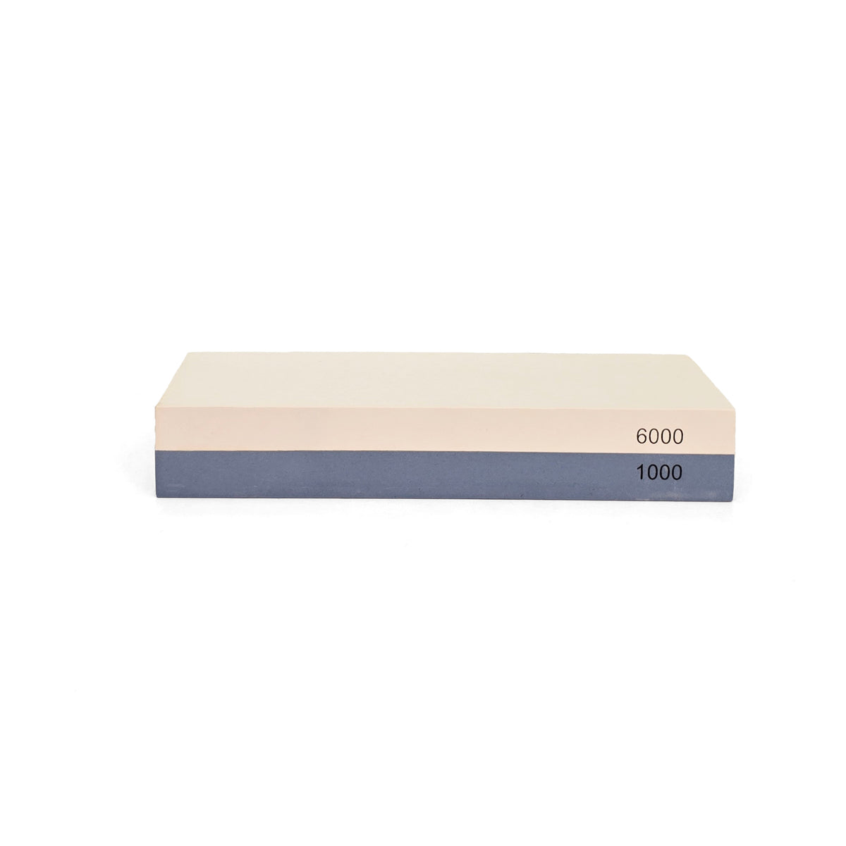 Two double-sided waterstones for tool sharpening, essential for maintaining sharp and effective woodworking tools