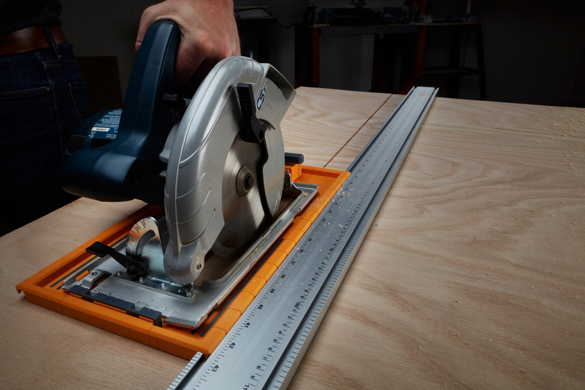 BORA NGX Clamp Edge Saw Guide 2500mm 100in in use for precise board ripping and sheet material cutting
