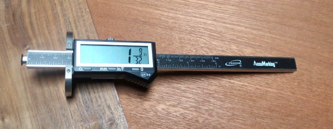 Digital wheel marking gauge in action marking wood with precision and ease