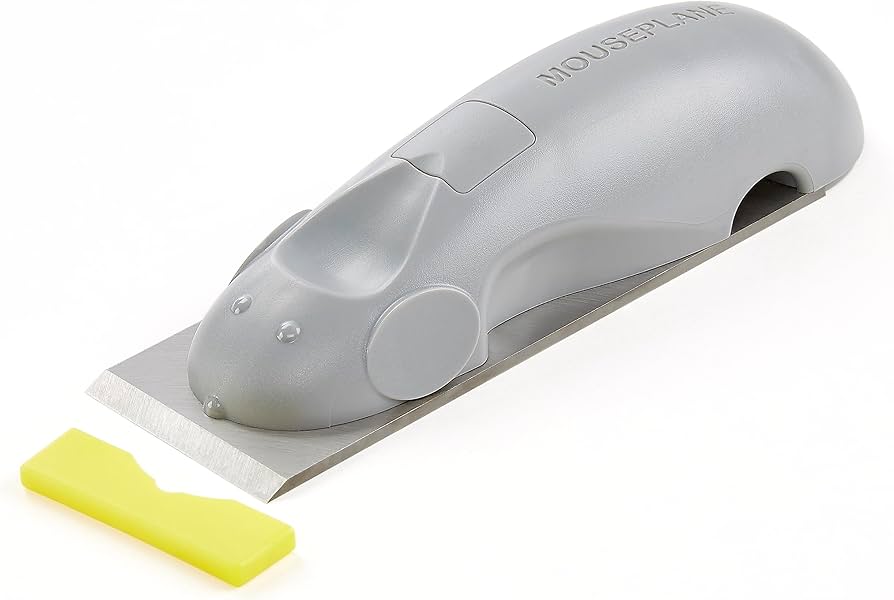 Power Adhesives Knottec Mouseplane trimming tool in action on wood surface
