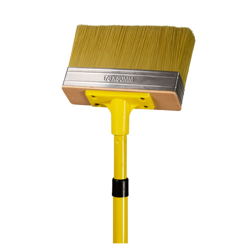 UniPro Jumbo Decking Brush 175mm Wide applying stain between deck boards, covering multiple boards in a single stroke