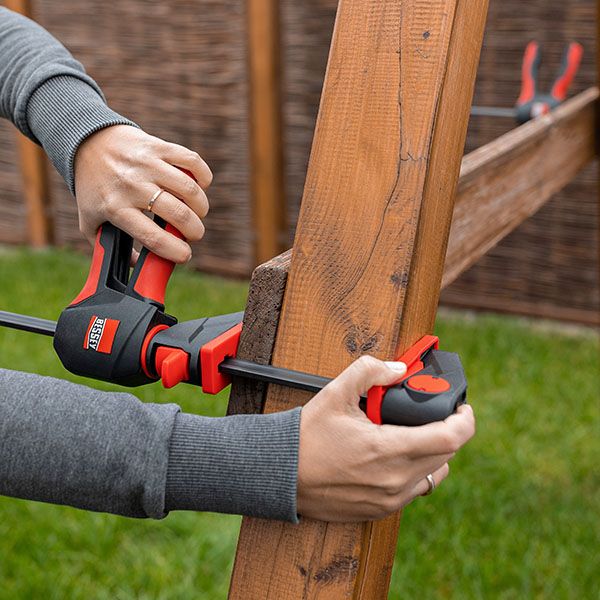 Bessey EZ360 One-Handed Clamp with Rotating Handle Grip in use on woodworking project