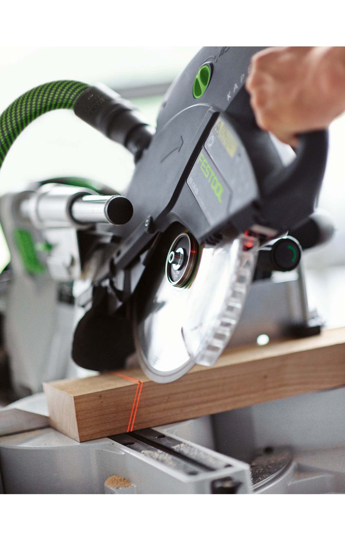 Festool KS 120R Set KAPEX 260mm Slide Compound Mitre Saw in use, cutting high skirting boards at finished angle
