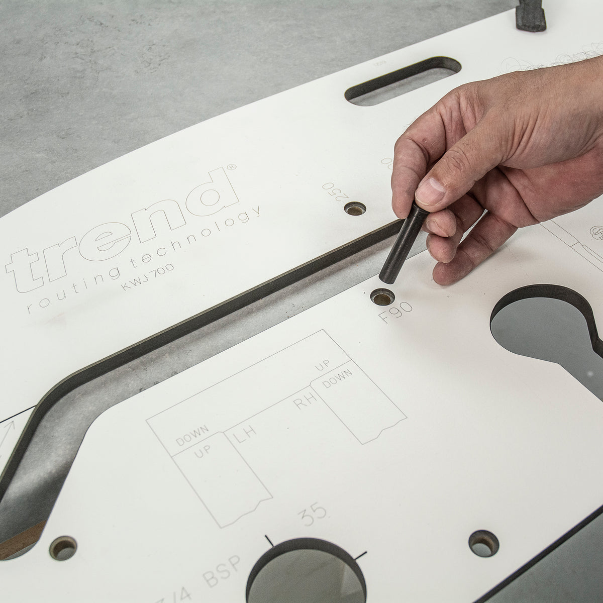 Trend 700mm Kitchen Worktop Router Jig in use, showing precise routing detail