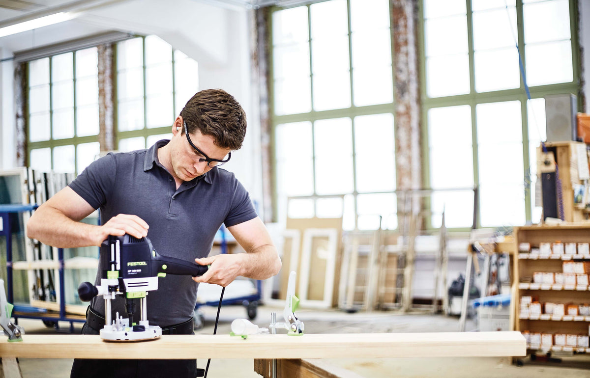 Festool OF 1400 70mm Plunge Router in Systainer, detailed view of router in use