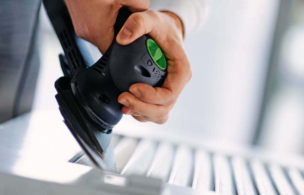Festool RO 90mm ROTEX 4-in-1 sander in Systainer, angled view showcasing corner sanding application