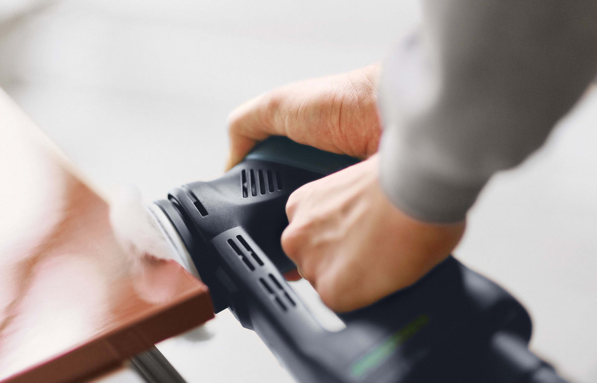Festool RO 90mm ROTEX 4-in-1 sander in use on wood surface