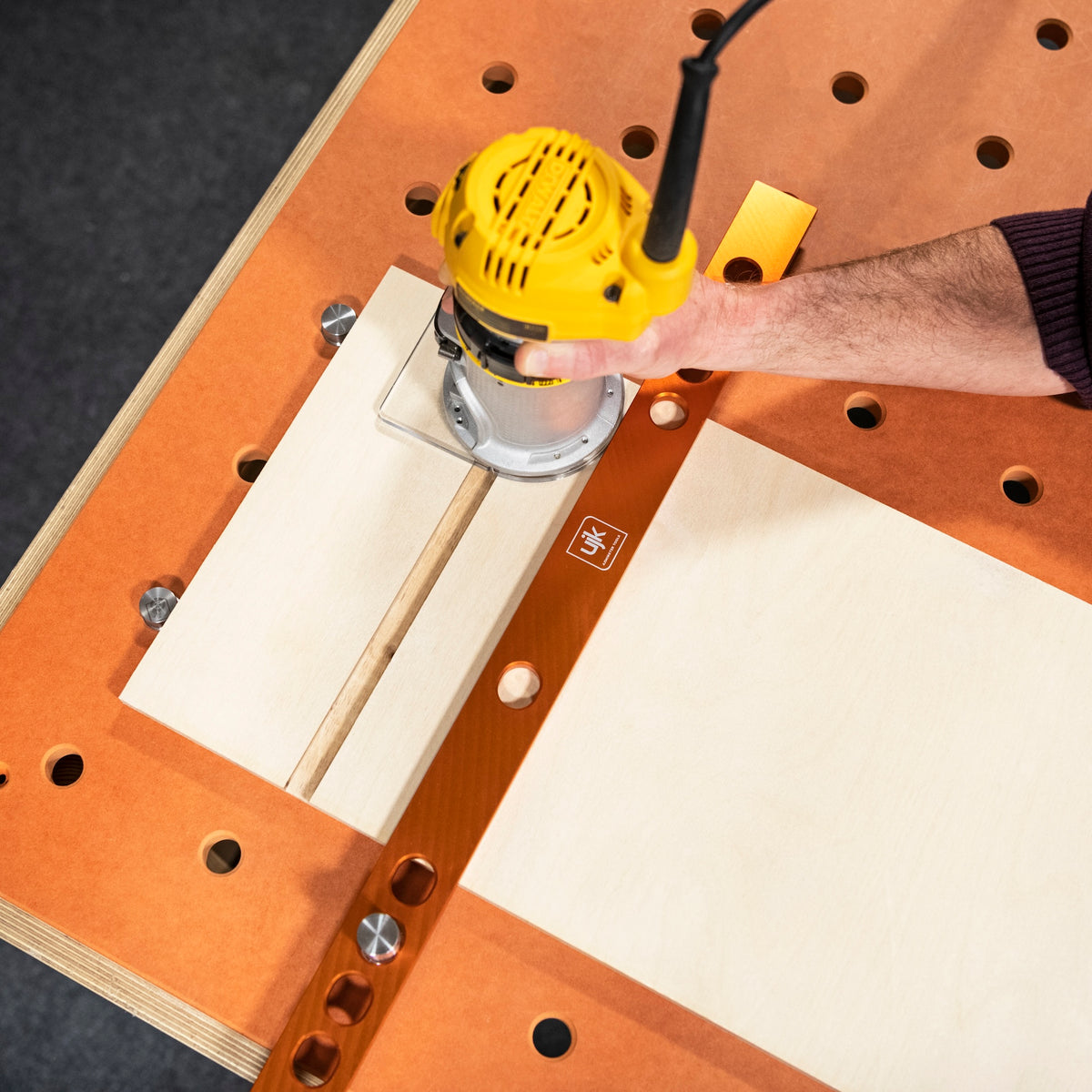 UJK Parf System Fence & Stop Kit 600mm long in use with bench dogs on woodworking table