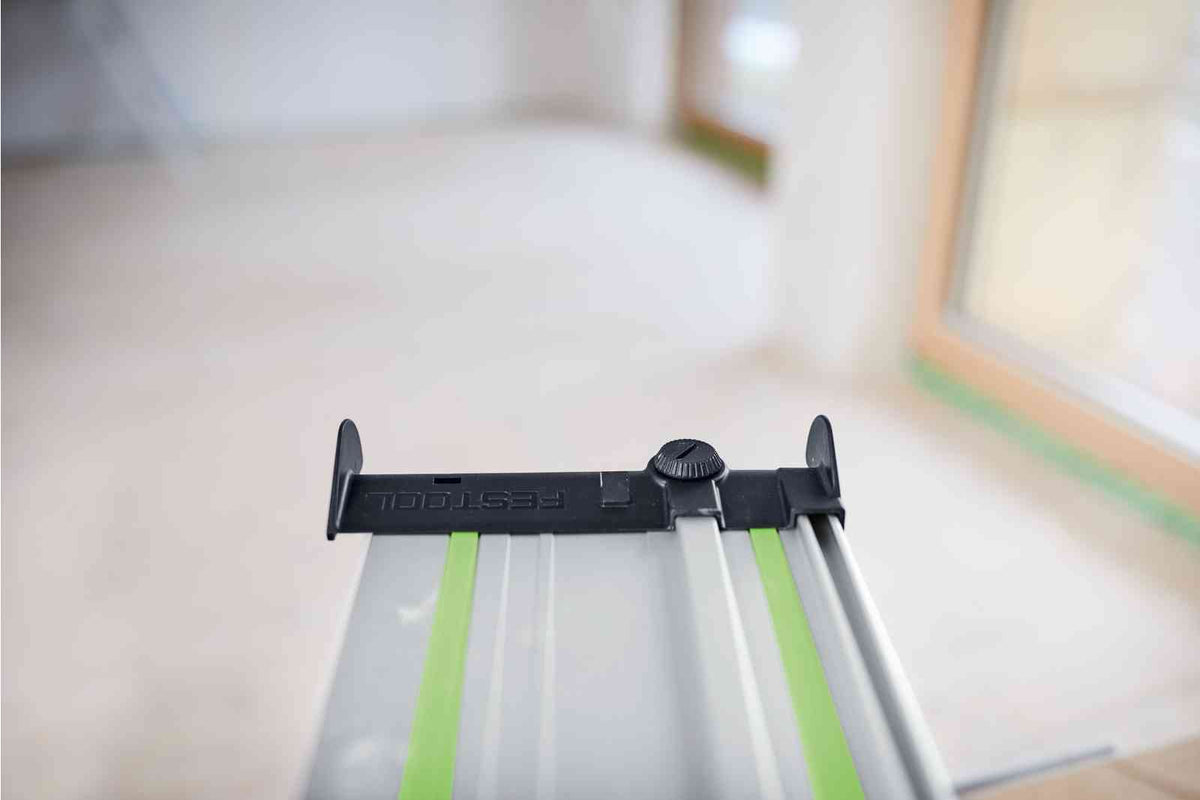 Festool FS Guide Rail Hose Guide Deflector attached to saw, prevents hose and cable tilting during use
