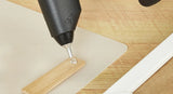 Power Adhesives Knottec Light Industrial Wood Repair Kit application on damaged wood surface