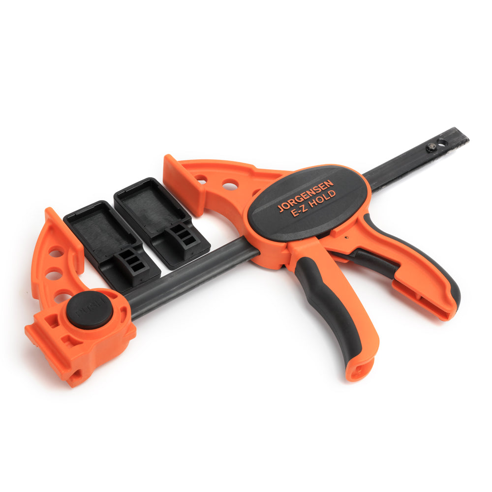 Pony Jorgensen E-Z Hold Medium Trigger Clamp in use on wooden workpiece