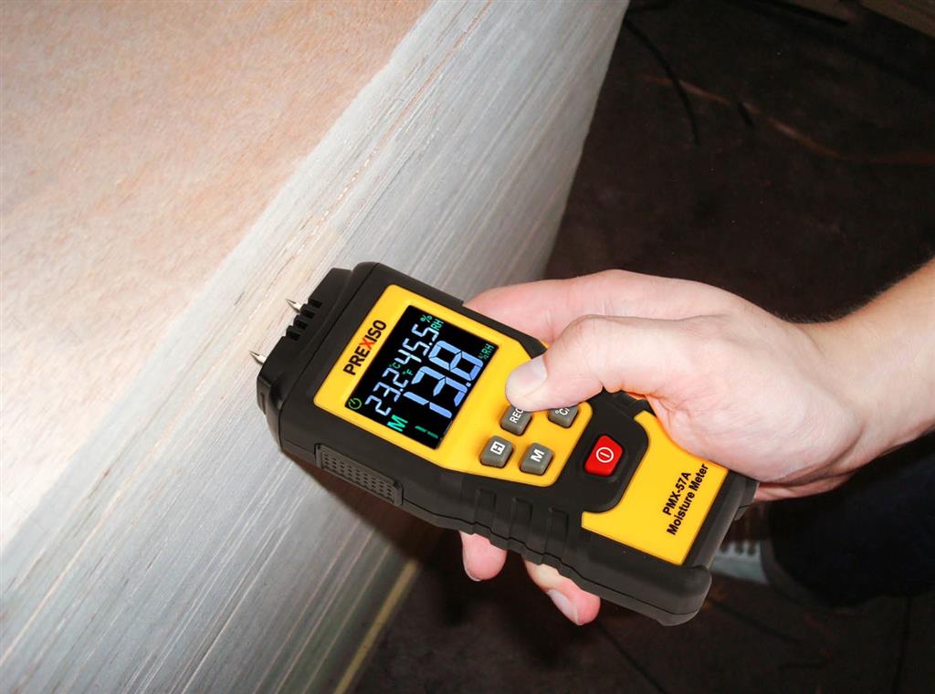 Woodworking moisture meter in protective case for accurate timber testing