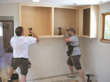 FastCap Upper Hand Cabinet Installation Support Poles in use for upper cabinet installation