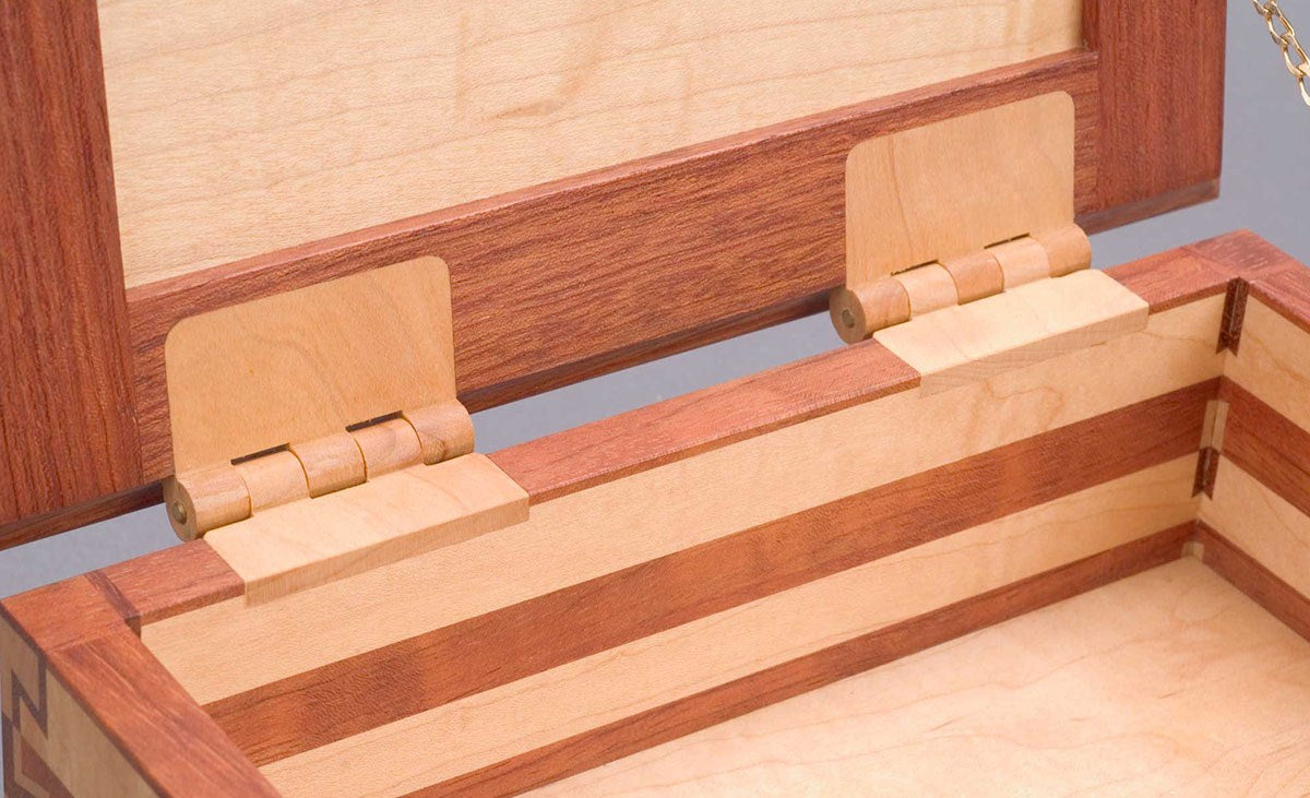 Incra HingeCrafter Jig demonstrating precise hinge installation on wooden cabinet
