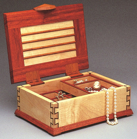 Incra Projects & Techniques Book showcasing detailed woodworking plans and techniques for LS Positioner joinery