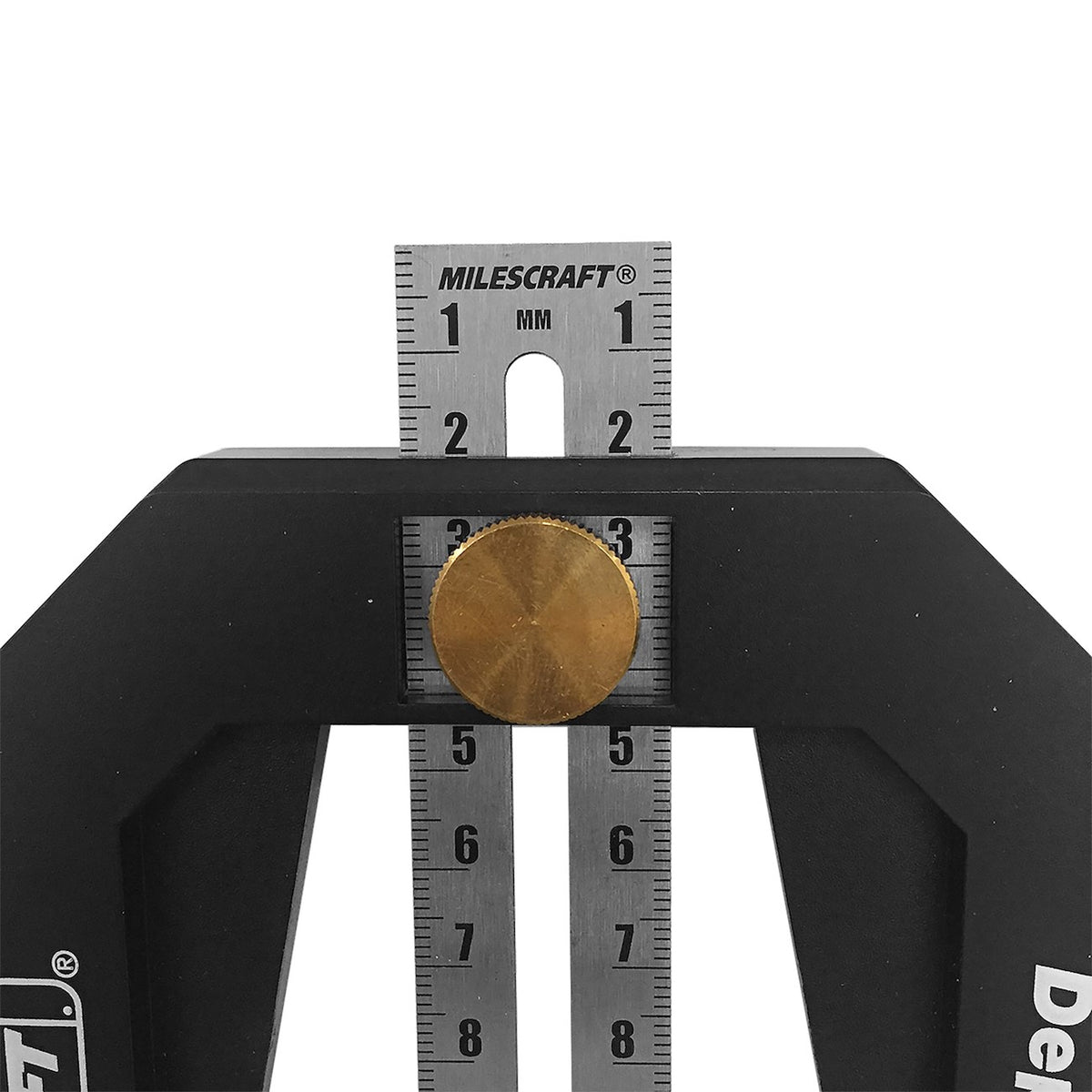 Milescraft DepthGauge showing metal scale in millimetres and inches on table saw throat