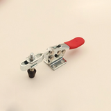 Small horizontal toggle clamp mounted on woodworking bench. Ideal for repetitive clamping in various applications