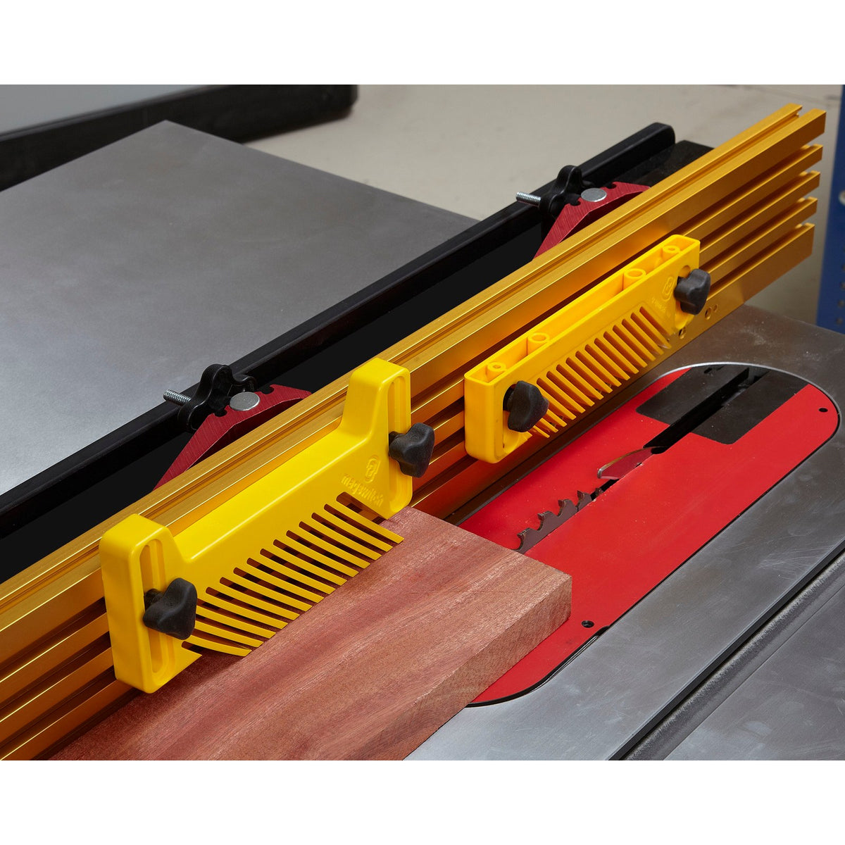Magswitch Vertical Featherboard Attachment Kit with Risers in use on wood piece