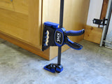 Fastcap Jack Of All Trades Reversible Trigger Clamp and Jack Lifter in action on woodworking project