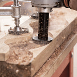 Arbortech Mini Turbo Wood Sculpting Kit in action, creating detailed wood carvings with precision