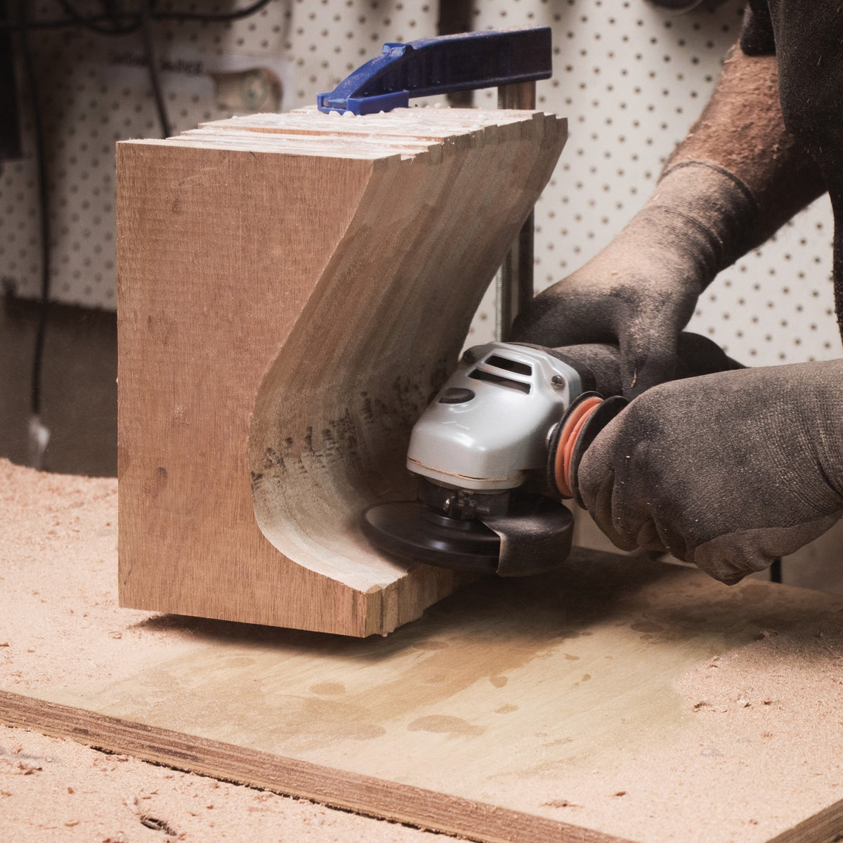 Arbortech Turbo Plane Blade in action, shaping wood with an angle grinder