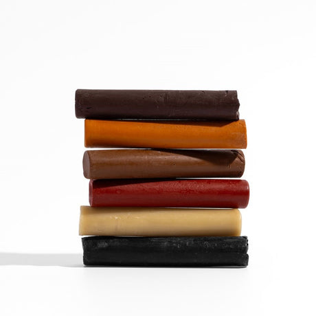 Set of 6 beeswax filler sticks in various wood tones for repairing cracks and holes on wood surfaces