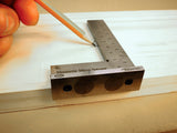 FastCap Magnetic Micro Square attached to a table saw for precise adjustments