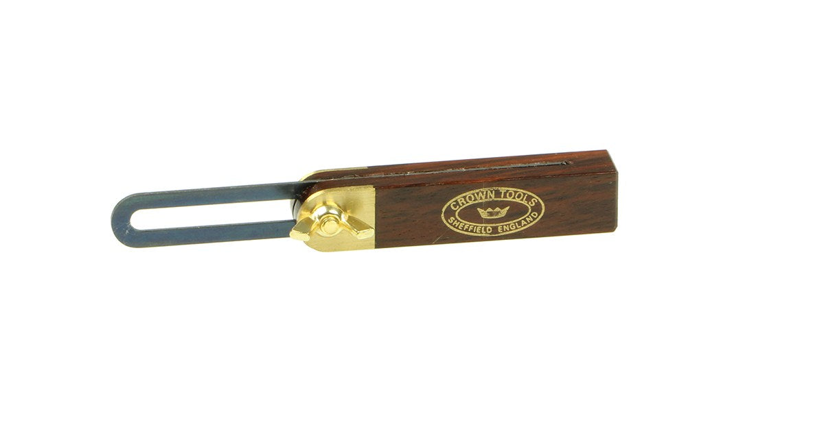 Crown Sliding Bevel 100mm Blade 75mm Rosewood & Brass Handle, angled view showcasing solid brass wing nut securing the blade