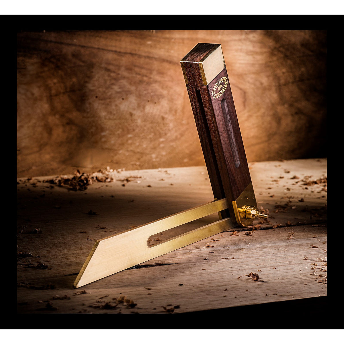 Crown Sliding Bevel 230mm Brass Blade 145mm Rosewood & Brass Handle tool displayed at an angle