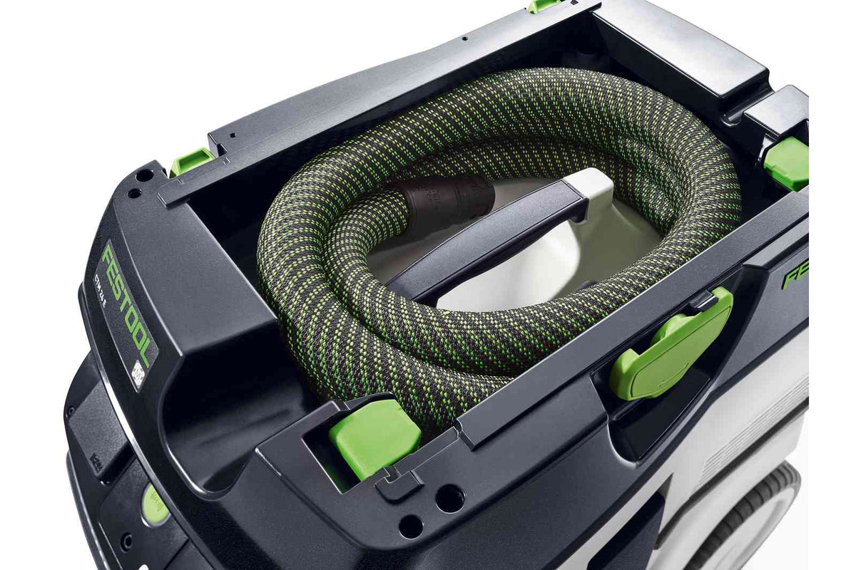 Festool CTM 26L M Class Dust Extractor in use, capturing sawdust during woodworking work