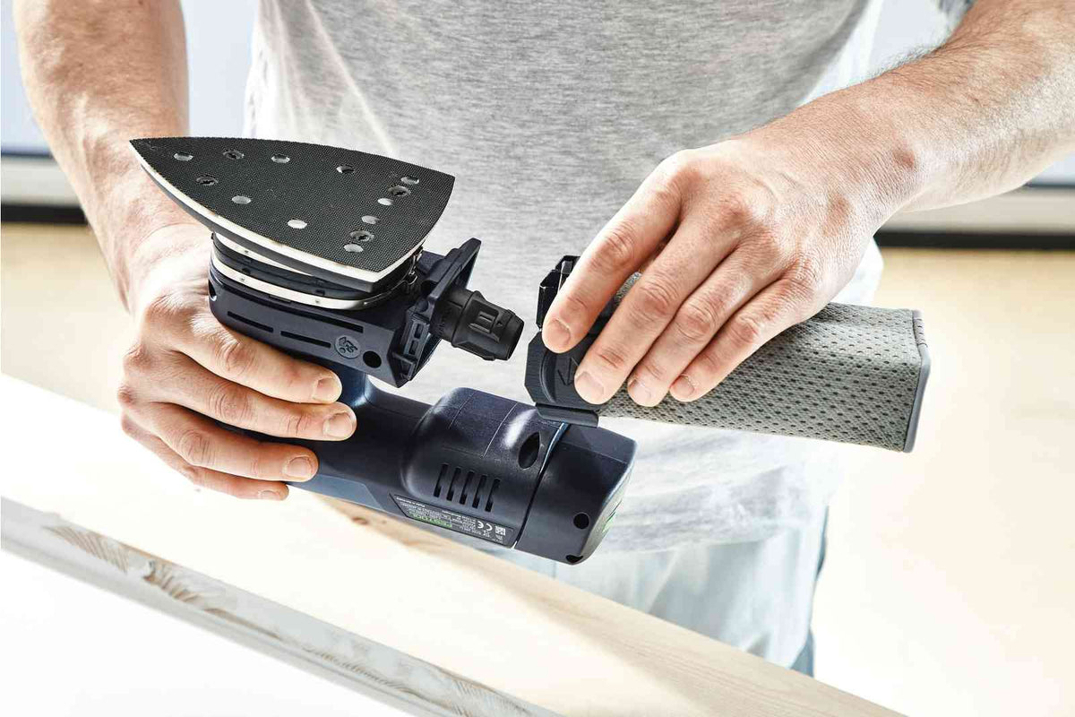 Festool StickFix Delta Backing Pad 100mm x 150mm in use on corner sanding work on windows, doors, or furniture