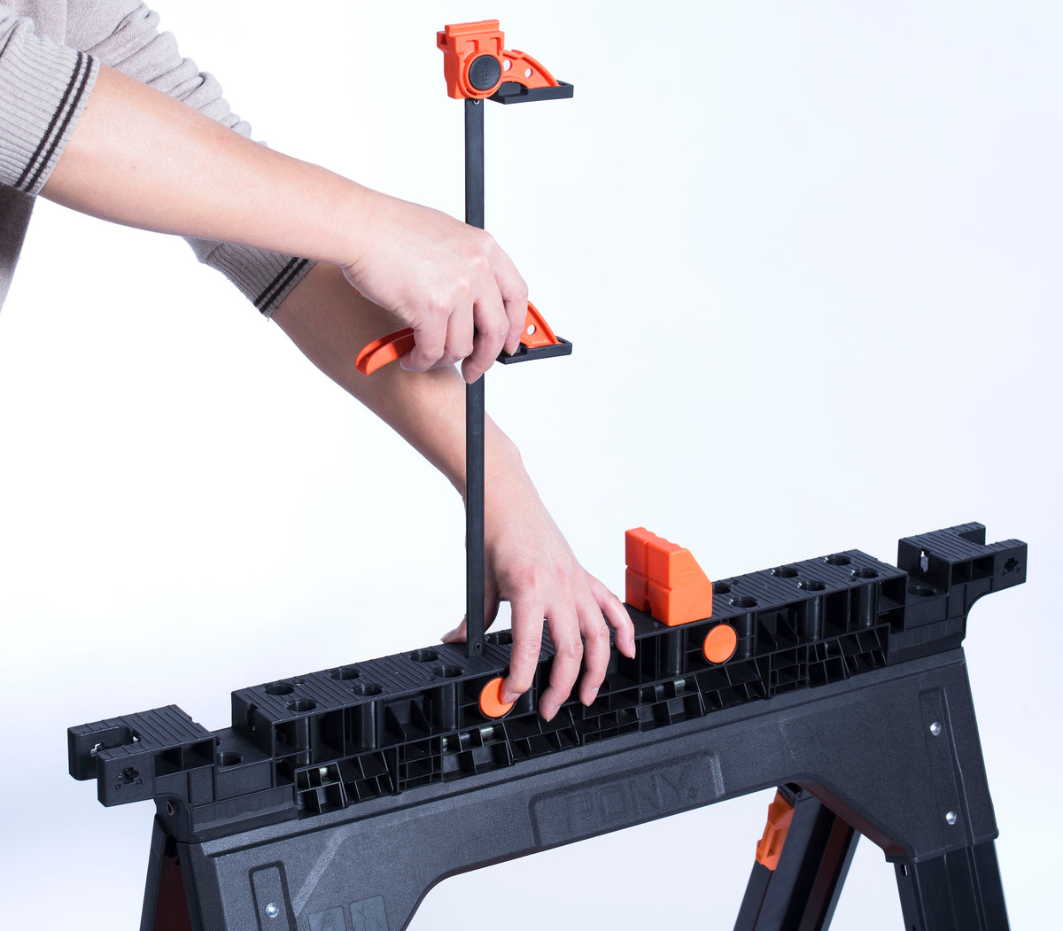 Pony Jorgensen 2-Piece Clamping Sawhorse with Clamps & Bench Dogs in use at woodworking site