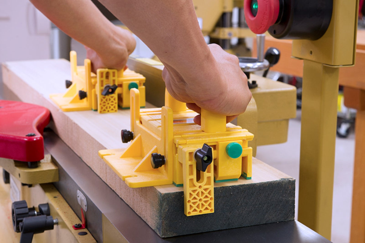 MicroJig Adjustable Gravity Heel Set attached to GRR-Ripper for enhanced support and safety on long workpieces